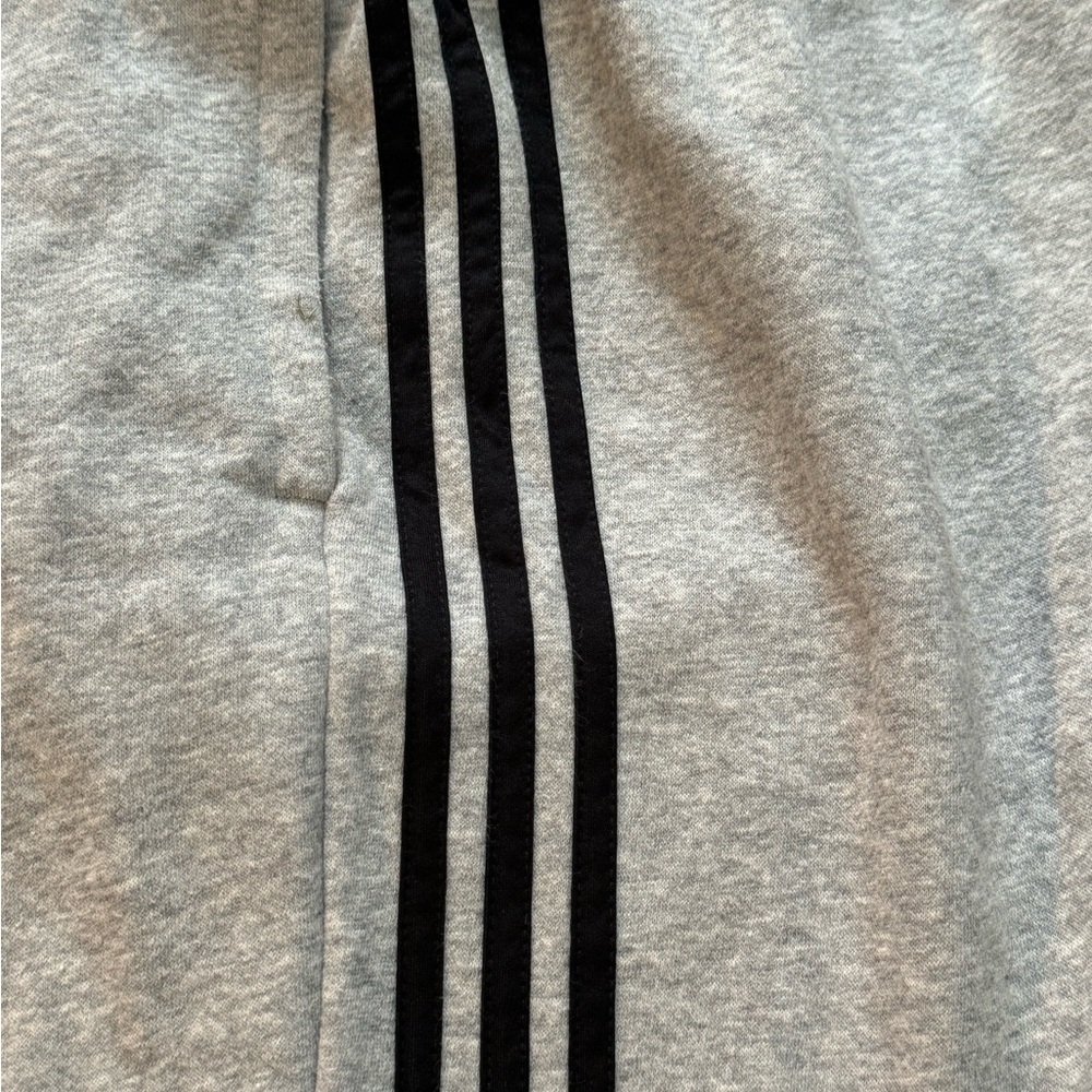 Men’s grey Adidas sweatpants. Elastic leg cuffs. Like new - worn twice.